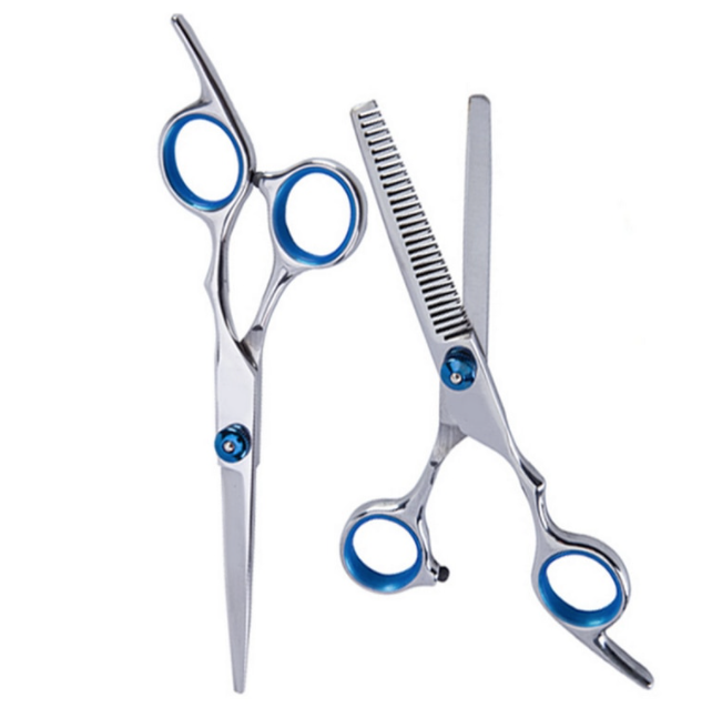 Uitgebreide kappersset voor thuis: bevat scharen, kammen en accessoires voor professionele haarstyling.