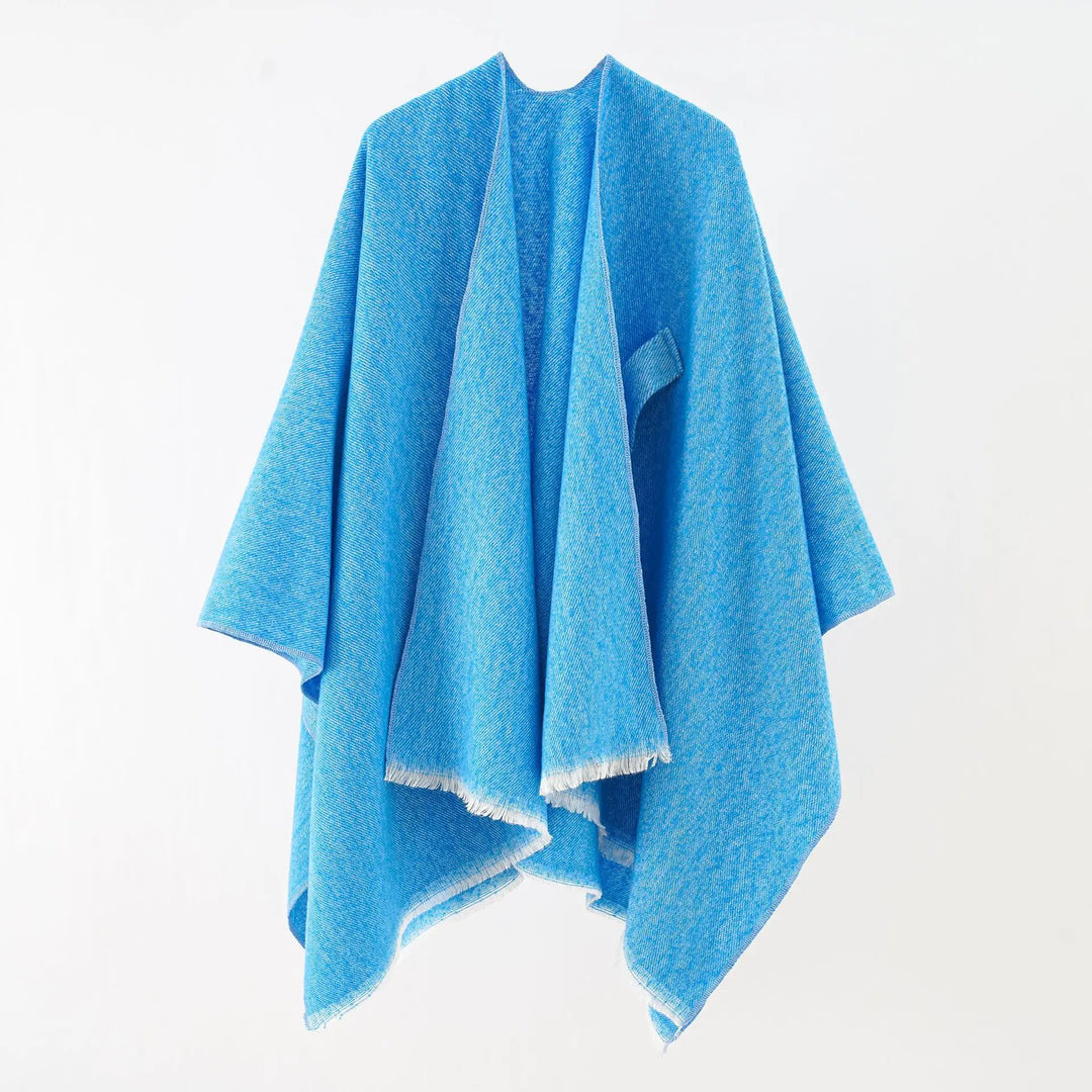Praktische warme damesponcho van zachte kasjmierlook, perfect voor layering. Effen retro vest.