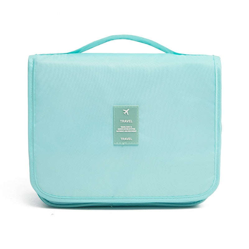 Overzicht van de verschillende vakken in de hangende make-up tas voor damesaccessoires