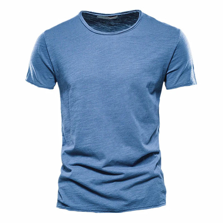 Kwalitatief heren t-shirt. Ademend, kreukvrij, met korte mouw en ronde hals. Simpel en comfortabel.