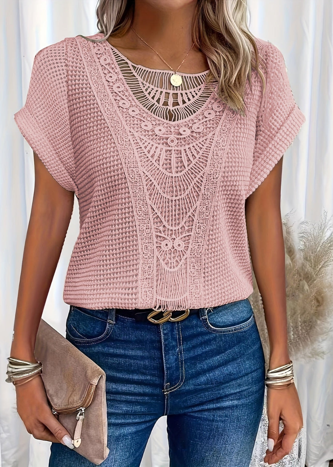 Zwarte dames top met elegant kanten detail en korte mouwen