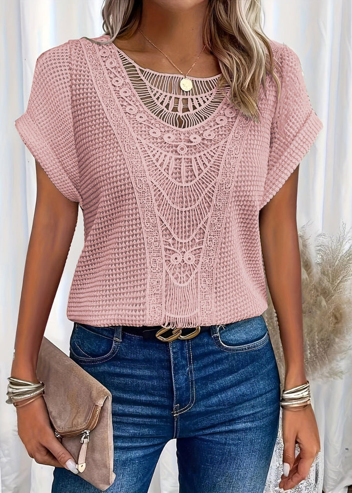 Zwarte dames top met elegant kanten detail en korte mouwen
