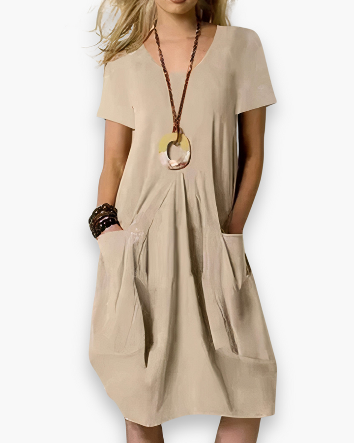 Midi-jurk voor dames in zacht beige, perfect voor dagelijks comfort en veelzijdige styling.