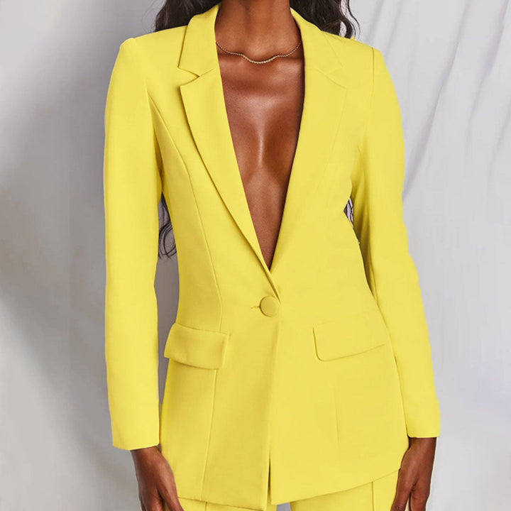 Stijlvolle dames blazer broek set, elegant voor zakelijk of feestelijk gebruik.