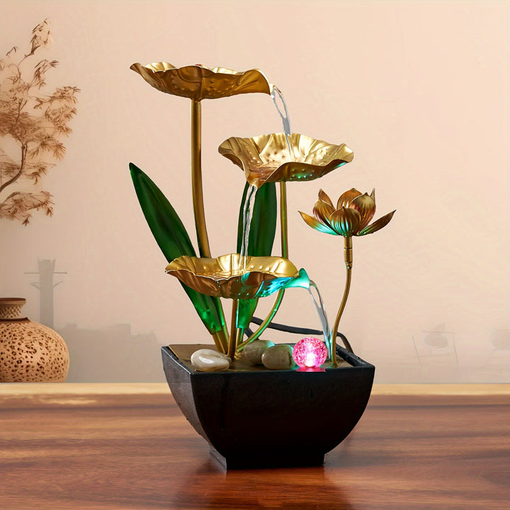 Lotus binnenfontein van dichtbij met stromend water en sfeervolle LED verlichting
