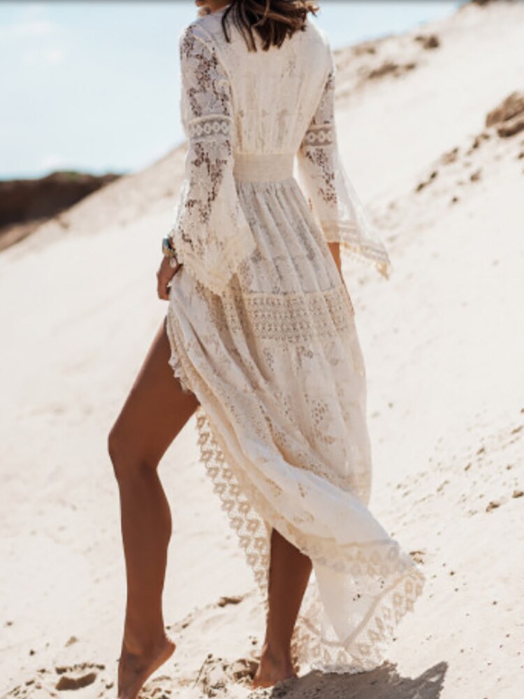 Trendy CarlijnDress dames maxi jurk in abrikoos en wit bohemian design, perfect als elegante lange zomerjurk.