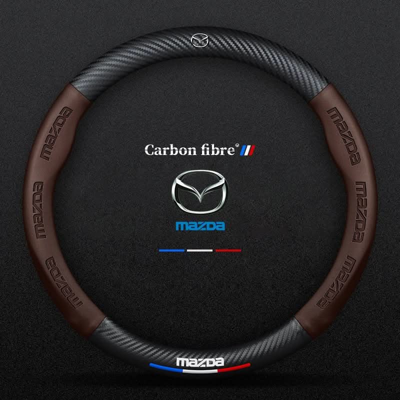 Ademende antislip stuurwielhoes met carbonlook en 3D-reliëf.