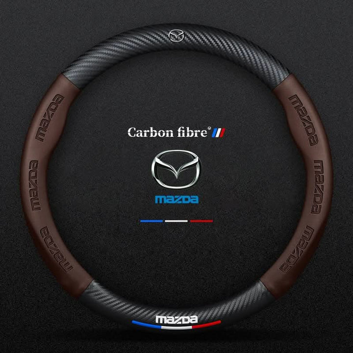 Ademende antislip stuurwielhoes met carbonlook en 3D-reliëf.