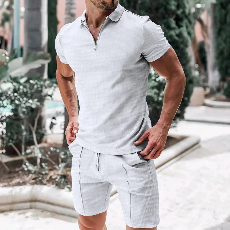 Stijlvolle Nilo heren zomerset: casual poloshirt & shorts voor streetwear of reisoutfit.