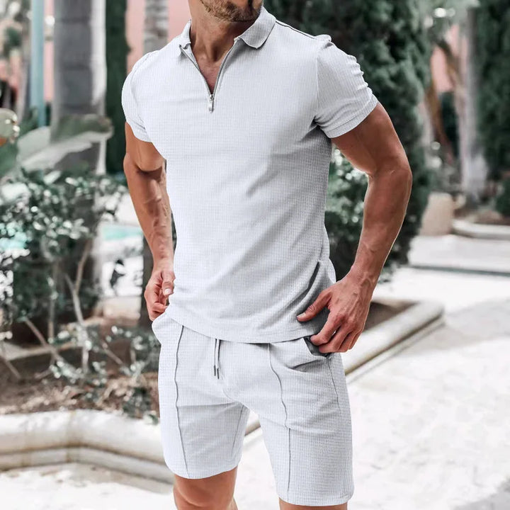 Stijlvolle Nilo heren zomerset: casual poloshirt & shorts voor streetwear of reisoutfit.