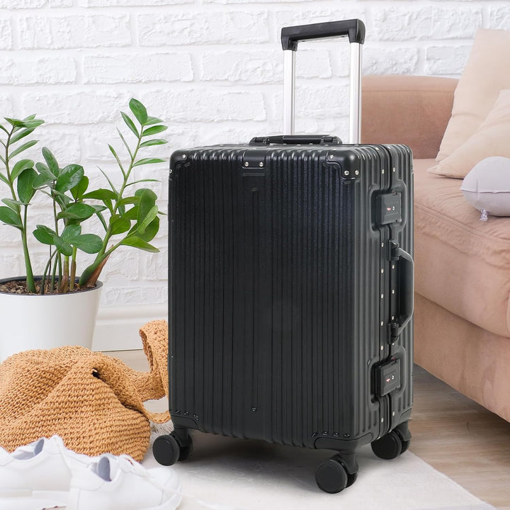 Moderne handbagage reiskoffer met geïntegreerd TSA-slot, aluminium frame en 360° stille zwenkwielen.