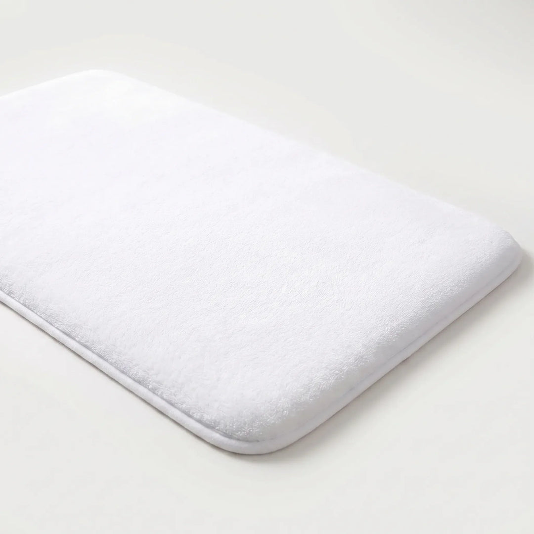 Luxe pluche badmat, heerlijk zacht en ultra absorberend, perfect voor comfort na douche of bad.