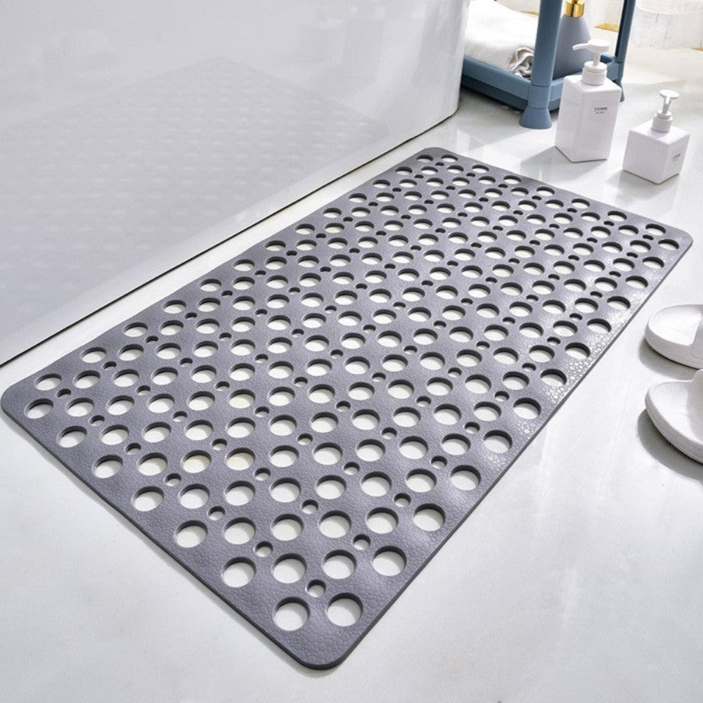 Antislip douchemat met innovatieve zuignappen voorkomt uitglijden; ideaal voor natte badkamervloeren.
