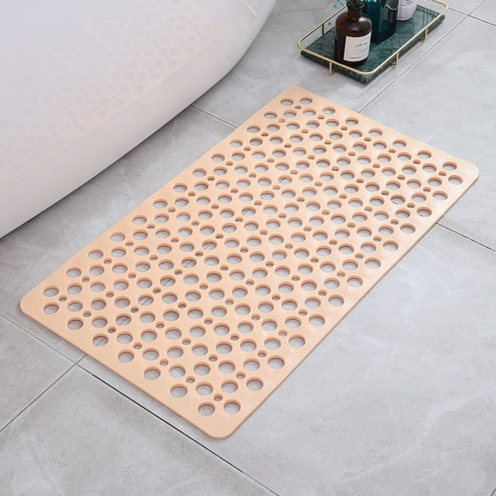 Sneldrogende antislip douchemat van pvc met zuignappen, verkrijgbaar in diverse kleuren zoals wit of roze.