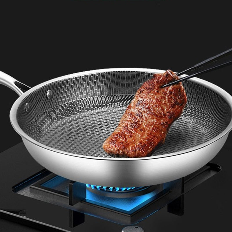 Aurora Wonen RVS koekenpan met anti-aanbaklaag, ideaal voor koken en bakken op inductie. Duurzaam kookgerei.