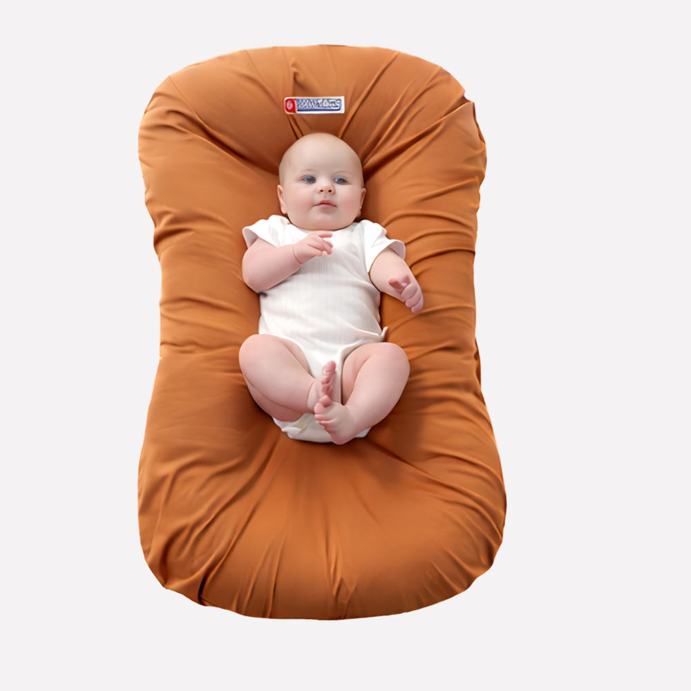 Ergonomisch babykussen voor pasgeborenen, ondersteunt hoofd en nek tijdens slaap of dutjes. Voor veilige rust.