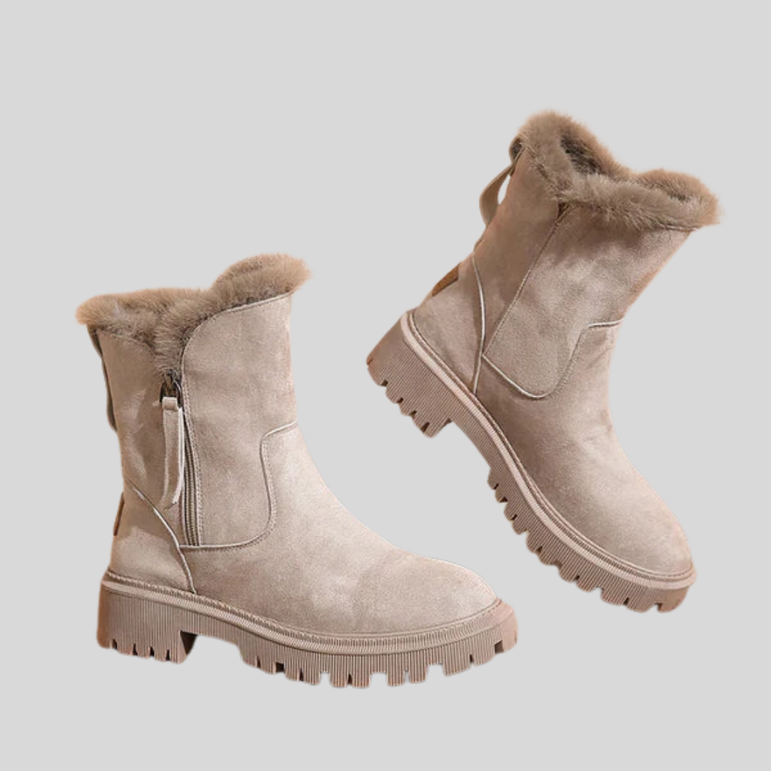 Beige dames thermische winterlaarzen, geïsoleerd en gevoerd voor comfort en warmte bij koud weer.