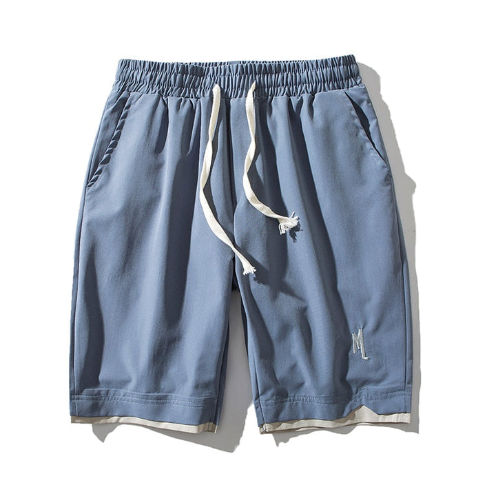 Rode Dante zomershorts voor heren, lichtgewicht met zakken, perfect voor strand of sportief gebruik.