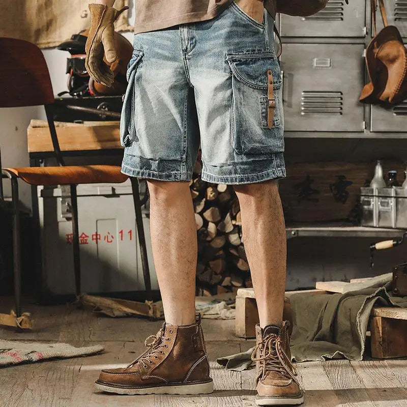 Blauwe heren denim cargo bermuda Ronex, retro motorstijl shorts voor robuuste zomerse streetwear look.