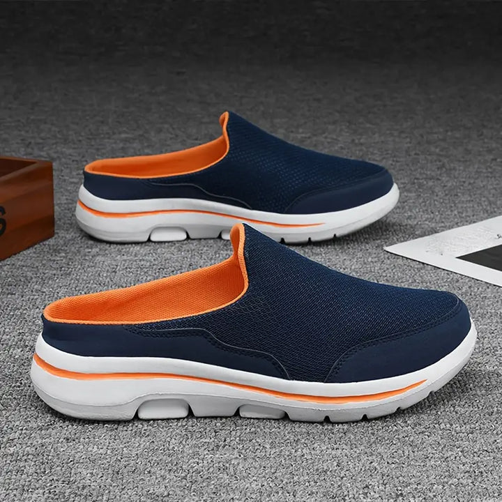 Comfortabele blauwe heren instappers, orthopedisch en lichtgewicht, met flexibele antislip zool.