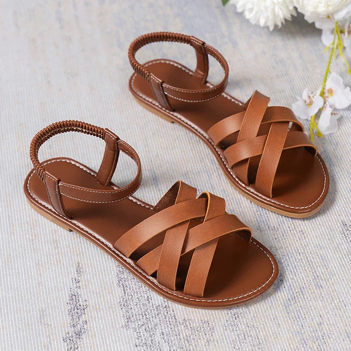 Trendy bruine Romeinse dames sandalen Yvelle met platte zool en antislip, ideaal voor zomerse dagen.