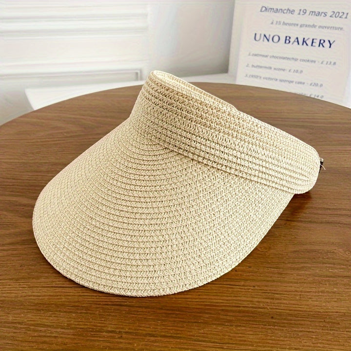 Elegante dames zonneklep, met brede rand en opvouwbaar design. Ideaal voor strand, UV-bescherming en chique look.