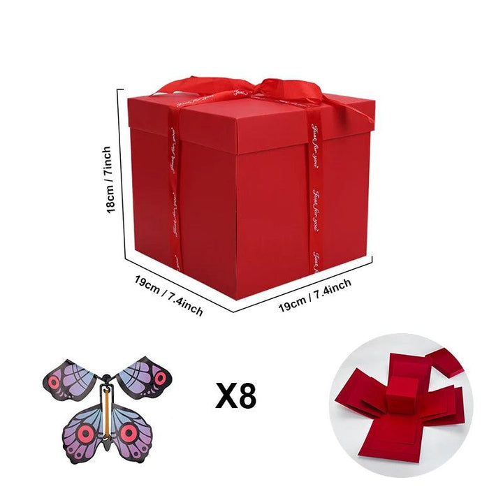 Cadeau explosiebox, een persoonlijk geschenk met vliegende vlinders voor liefde en herinneringen.
