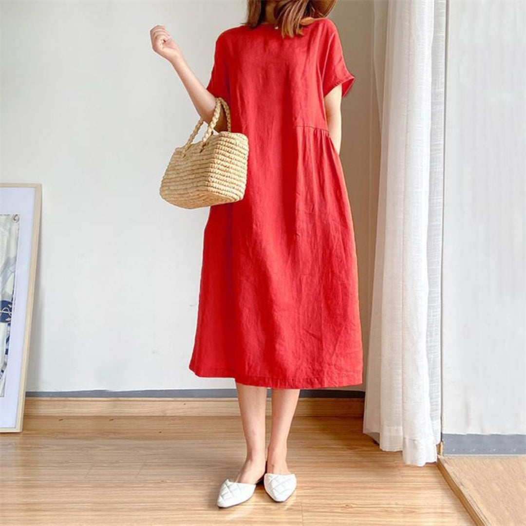 Dagelijkse comfortabele midi jurk voor dames, met korte mouwen en een ontspannen losse pasvorm.