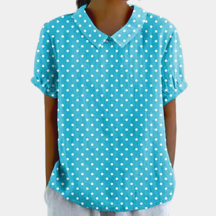 Casual damesblouse met kleurrijk bloemenpatroon, ronde kraag en korte mouwen, ideaal voor zomerse stijl.