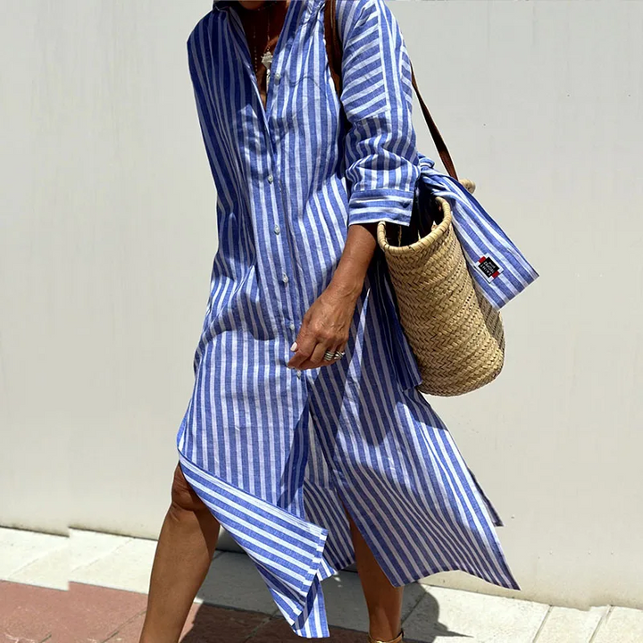 Elegante en relaxte gestreepte midi overhemdjurk voor dames, een must-have in de moderne damesmode.