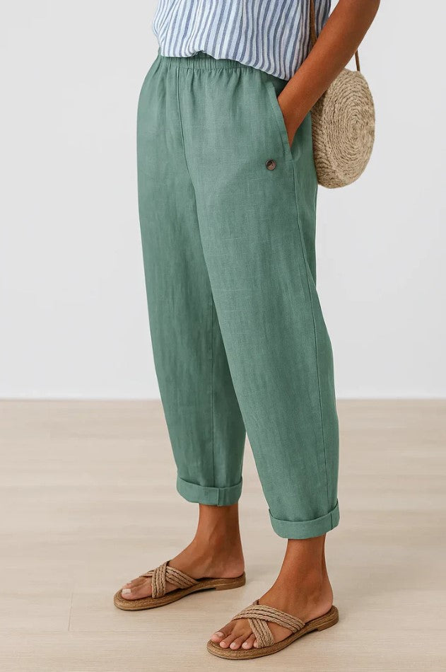Turquoise relaxed fit broek voor dames, een frisse kleurkeuze voor een veelzijdige garderobe.