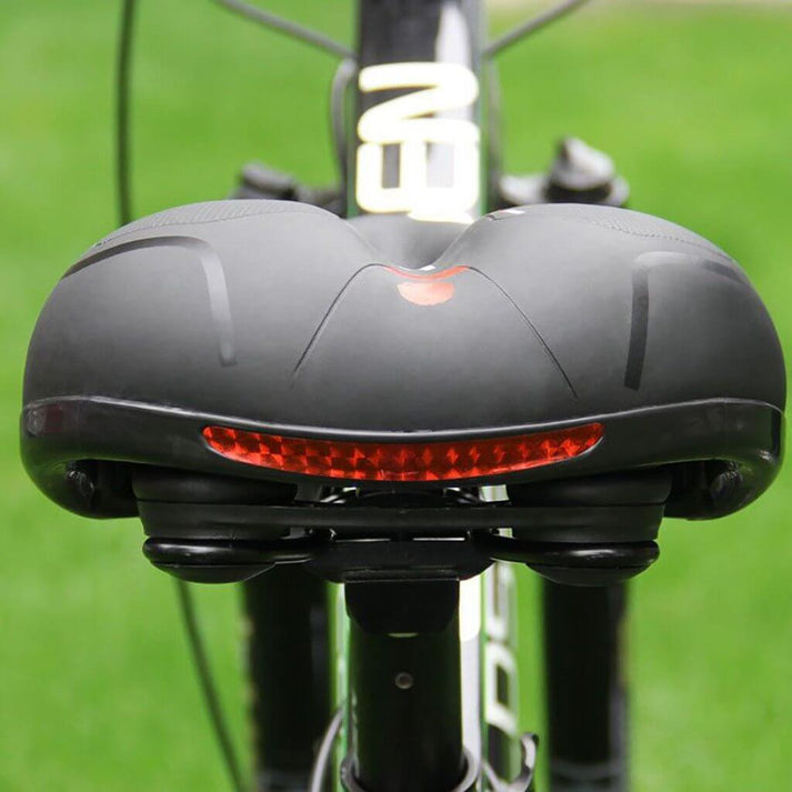 Rood comfort fietszadel, schokabsorberend, ergonomisch. Pijnvrij fietsen op elke fiets, stadsfiets/MTB.