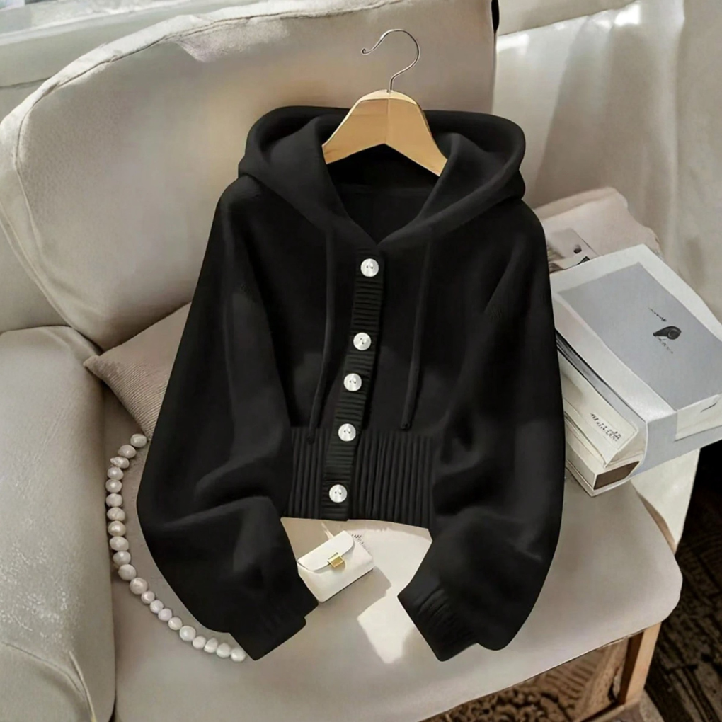 Zacht gebreid vest met capuchon, openvallend model voor vrouwen. Comfortabel en warm, ideaal voor dames casual kleding.