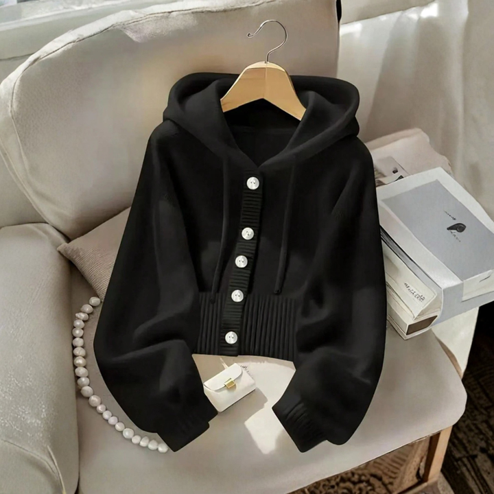 Zacht gebreid vest met capuchon, openvallend model voor vrouwen. Comfortabel en warm, ideaal voor dames casual kleding.