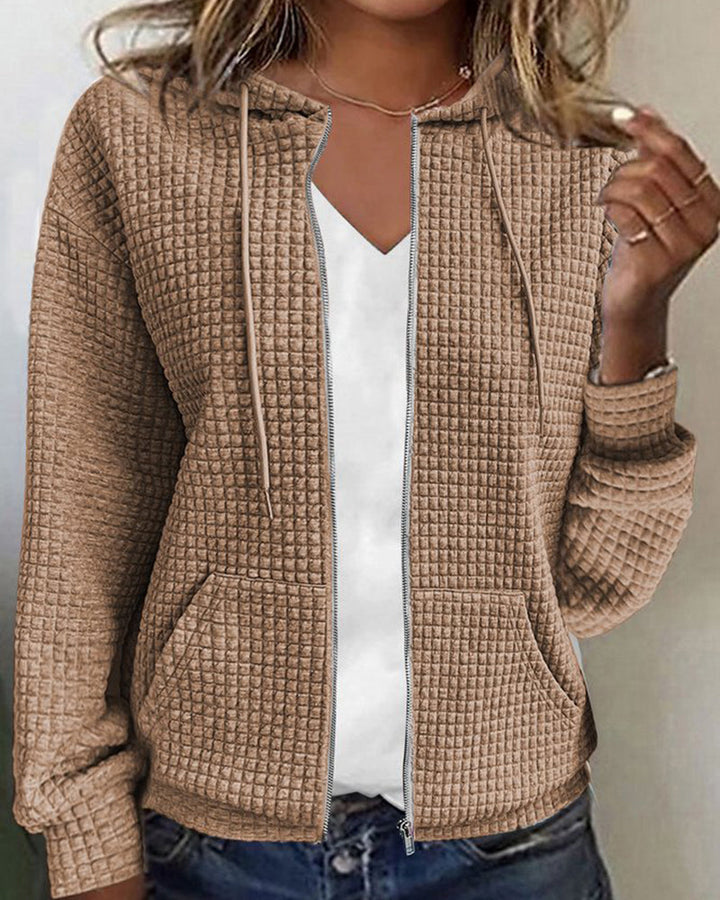 Comfortabel losvallend damesvest met capuchon en praktische zakken, ideaal voor een casual alledaagse look.