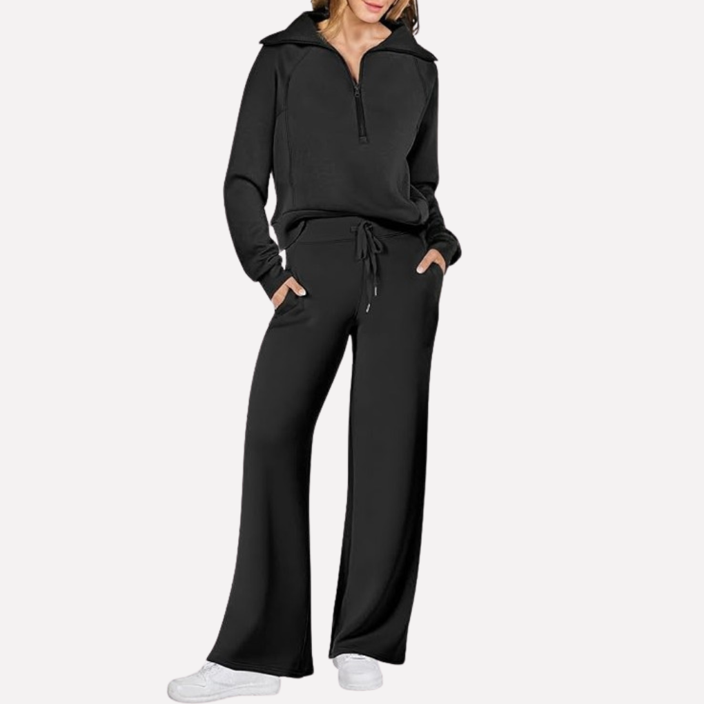 Model draagt een casual dames vakantiekleding set, comfortabel en chic, met een wijde broek.