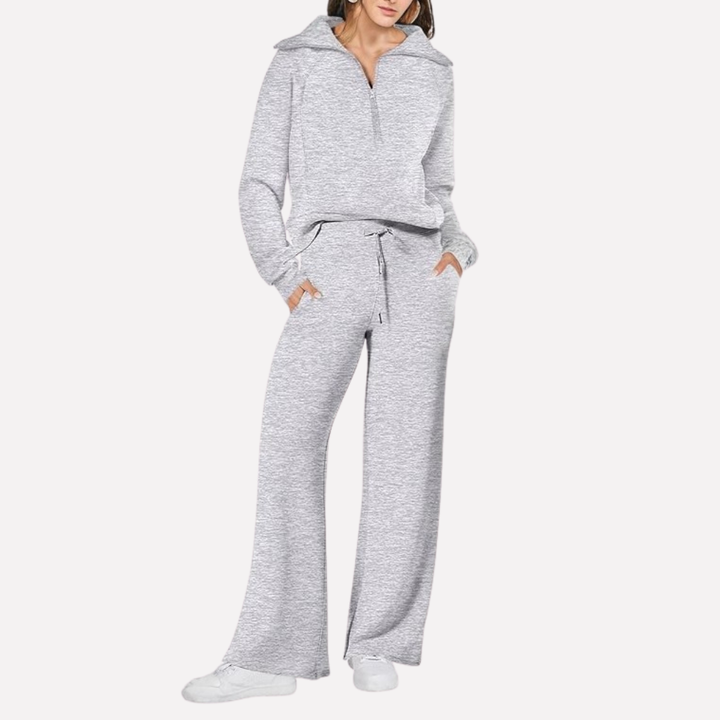 Gedetailleerde weergave van de wijde broek van de comfortabele dames reisoutfit, met elastische taille.