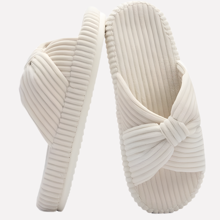 Comfortabele dames kruisband slippers met zacht voetbed voor thuis.