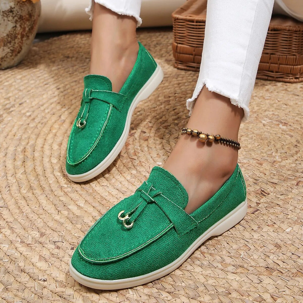 Klassieke leren dames loafers, elegante platte schoenen voor een tijdloze look.
