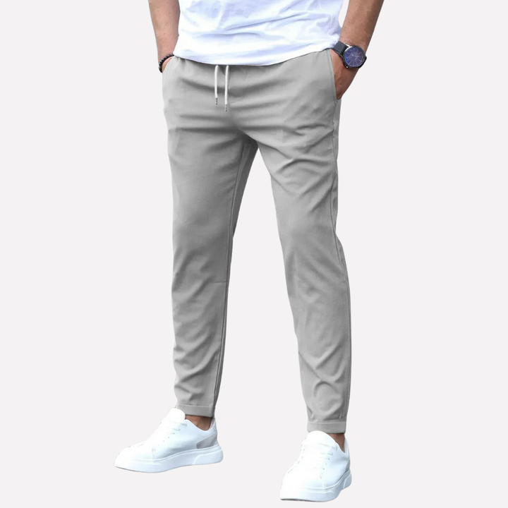 Comfortabele heren stretchbroek met rechte pasvorm, ideaal voor casual en smart casual looks. Elastisch en veelzijdig.