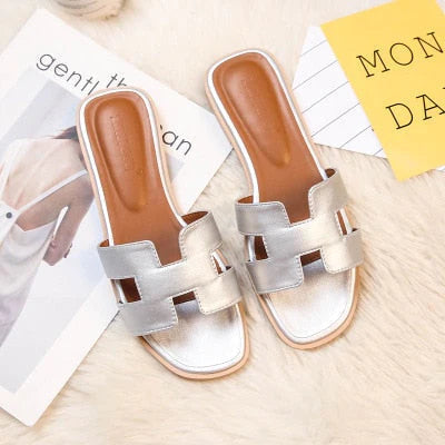 Elegante Jenelles H-slipper dames sandalen, ideaal voor comfortabele voetmode en modieuze damesmode in de zomer.