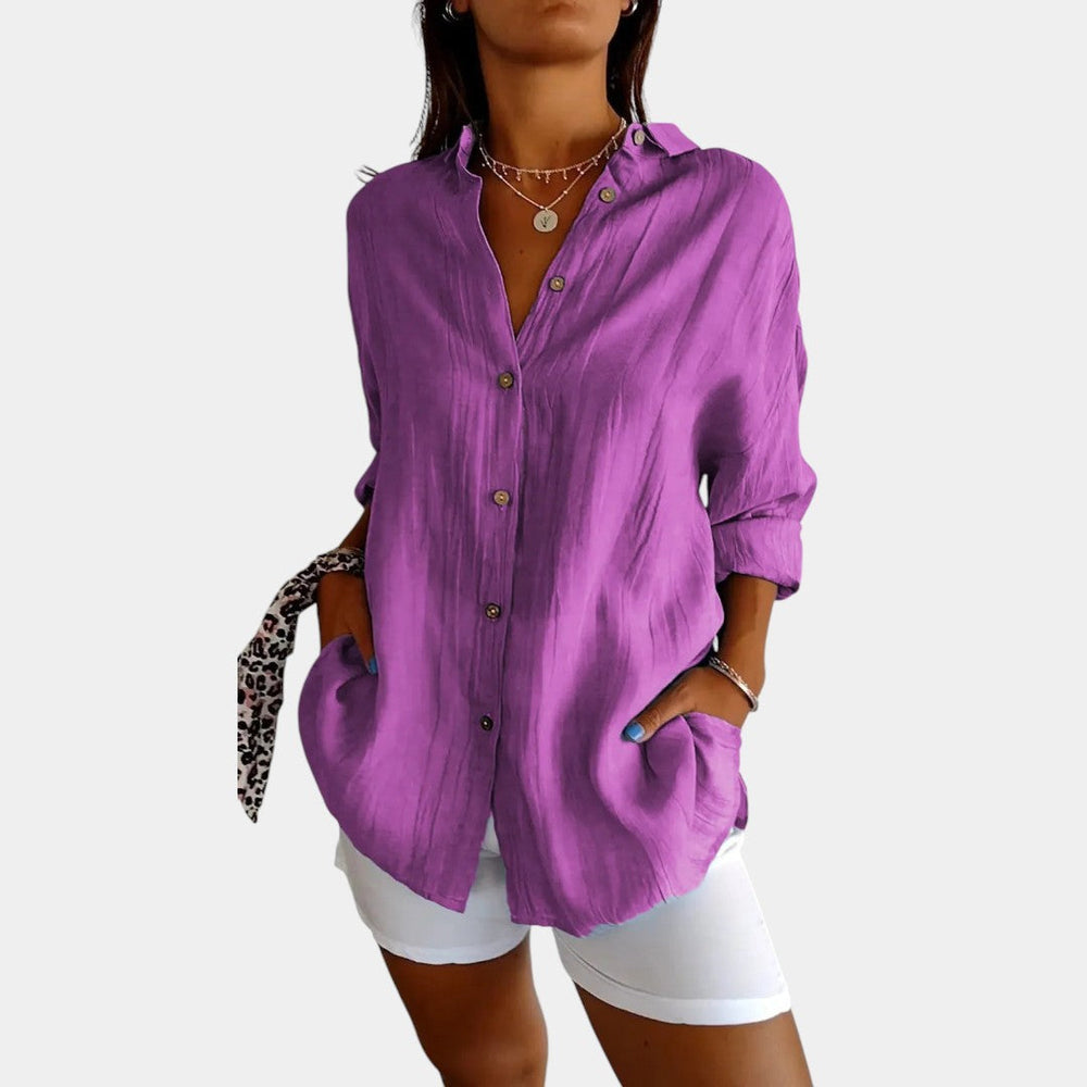 Modieuze effen damesblouse lange mouw, ideaal voor casual gelegenheden. Comfortabel, luchtig en stijlvol.