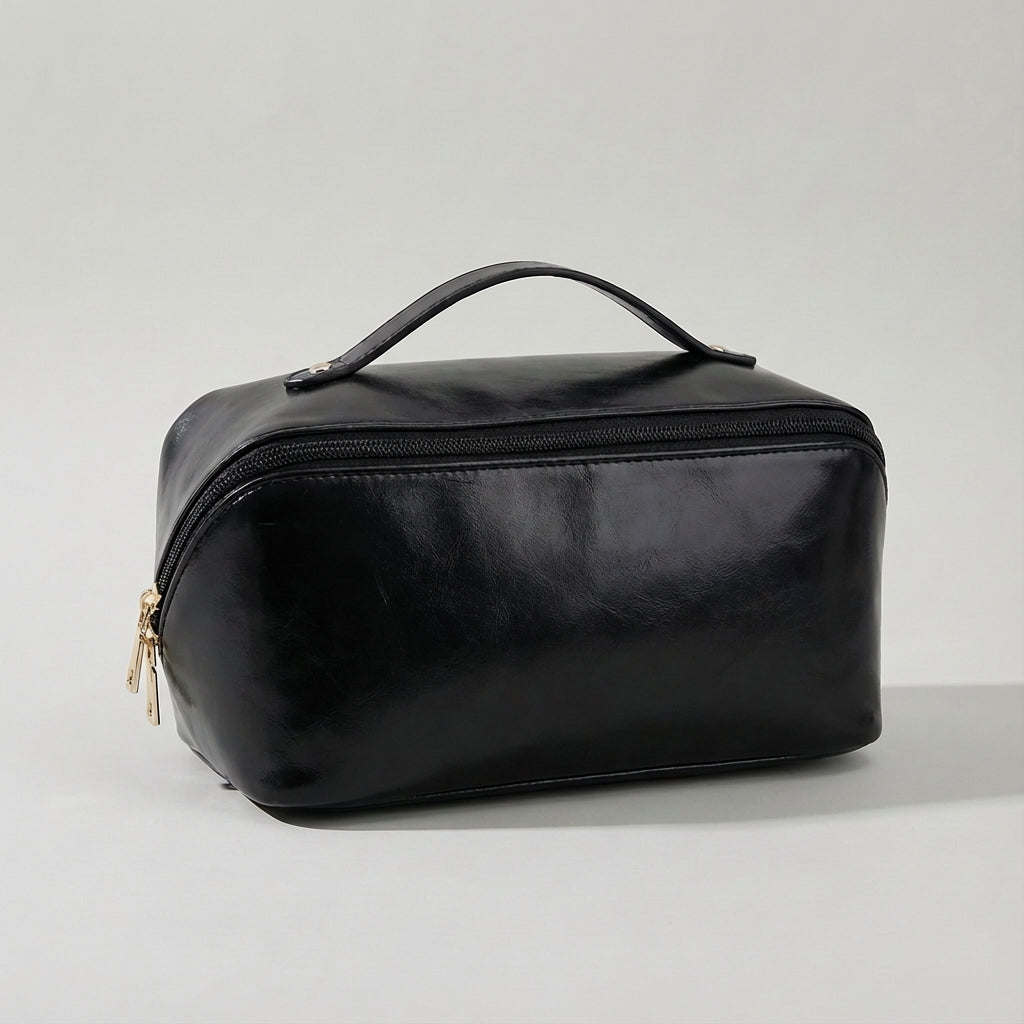 Compact dames toilettasje Glambox, een essentieel reisaccessoire voor georganiseerde make-up.