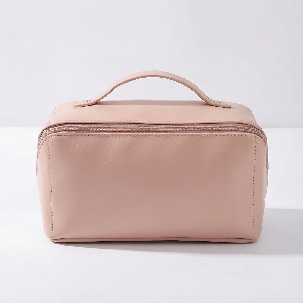 Detail van het compacte dames reistasje Glambox, met stevige rits en handig handvat voor draaggemak.