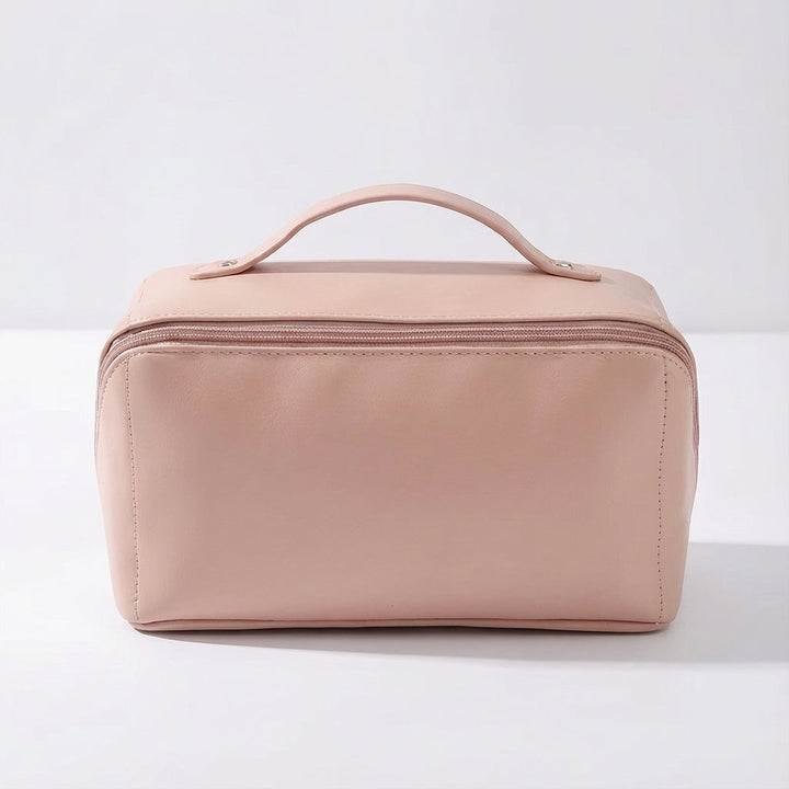 Detail van het compacte dames reistasje Glambox, met stevige rits en handig handvat voor draaggemak.