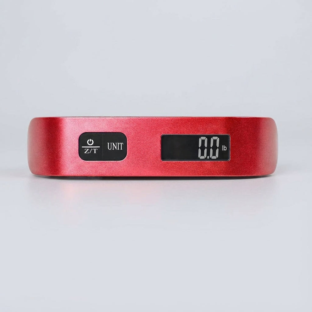 Draagbare handweegschaal TravelWeigh met digitaal scherm; ideaal reisaccessoire om overgewicht te voorkomen.