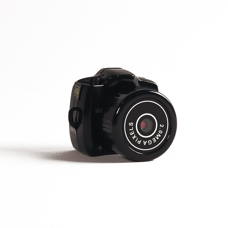 Compacte HD mini videocamera, draagbaar ontwerp met schokbestendige behuizing, ideaal voor scherpe 1080HD opnamen.