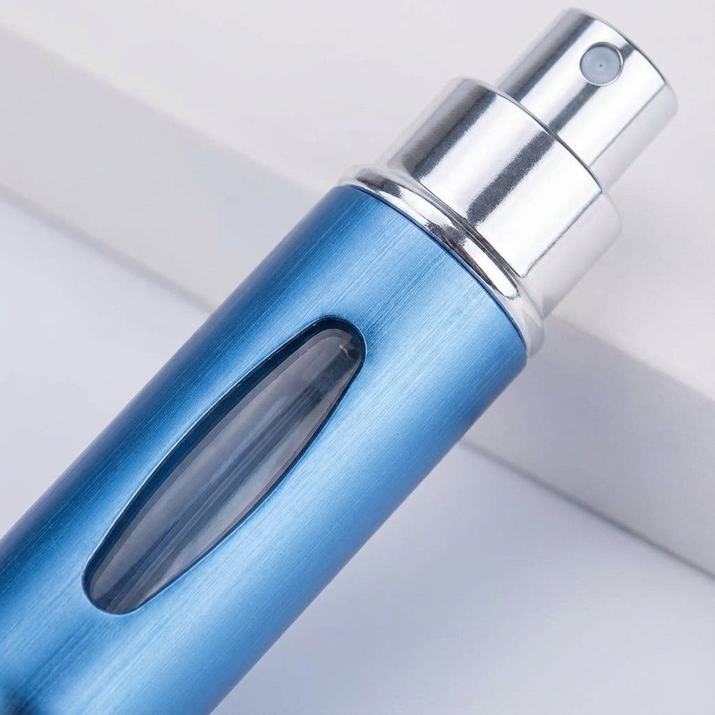 Stijlvolle navulbare parfumverstuiver voor dames en heren, perfect om geur discreet mee te nemen op reis.