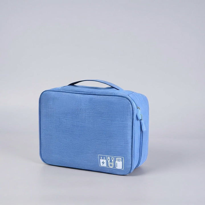 Compacte gadget opbergtas voor reizen, met ritssluiting om je telefoonaccessoires veilig te bewaren.