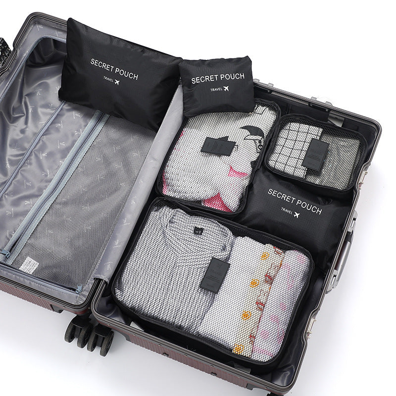 Complete set universele reisetuis voor georganiseerd inpakken. Pro packing cubes voor efficiënt opbergen van kleding.